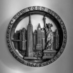 grayscale photography of New York City emblem